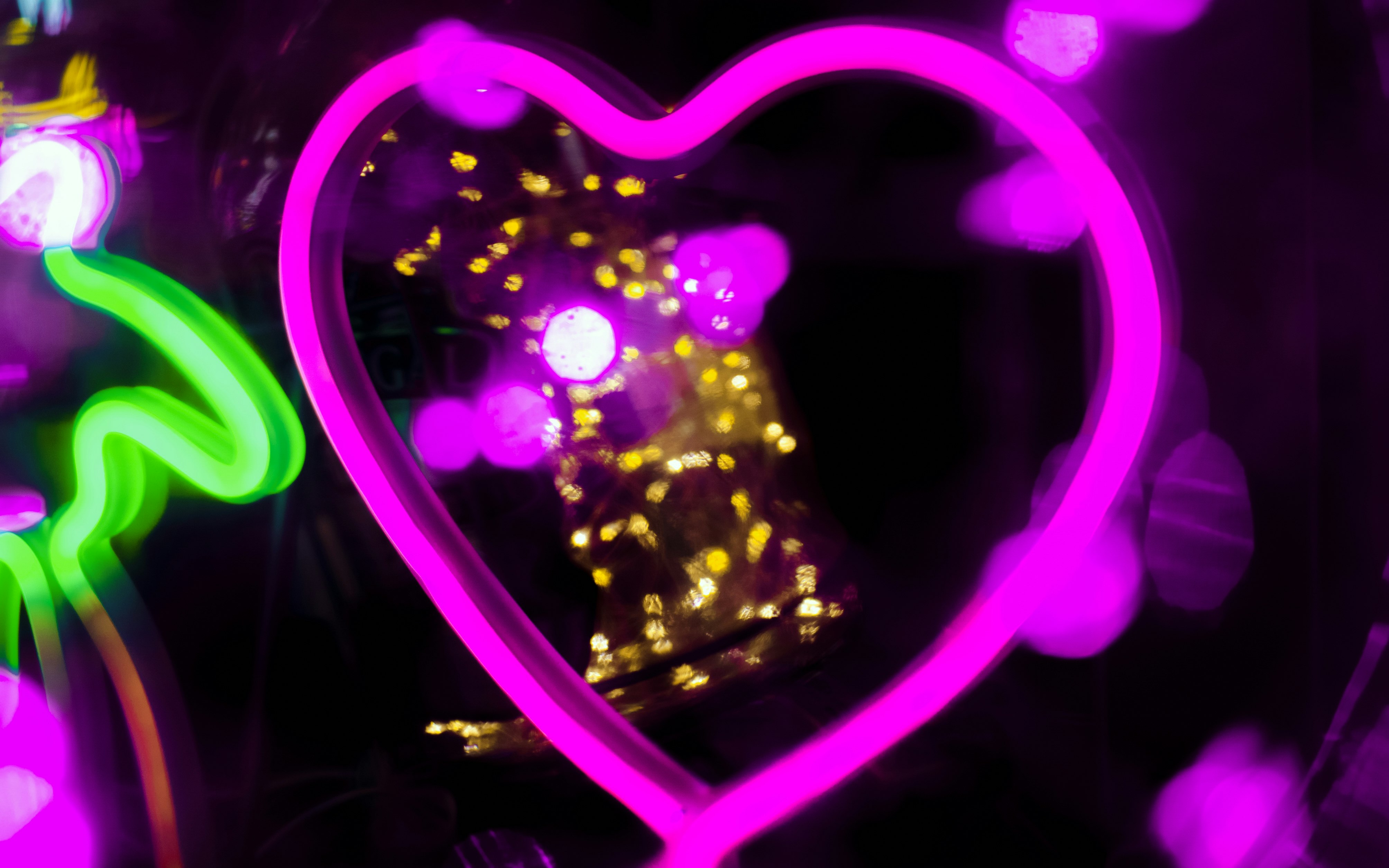 purple and pink heart light
